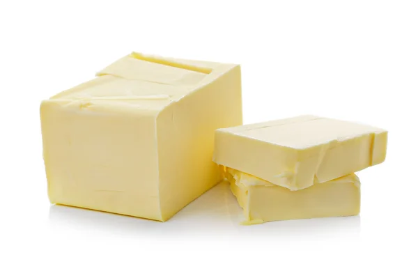 Manteiga sobre fundo branco — Fotografia de Stock