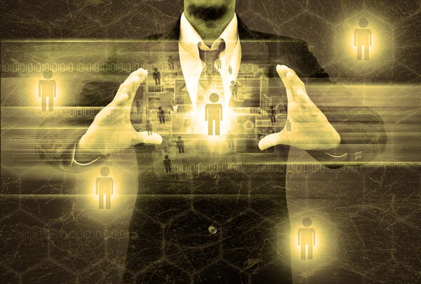 Businessman holding social network in the old texture — Stock Photo, Image