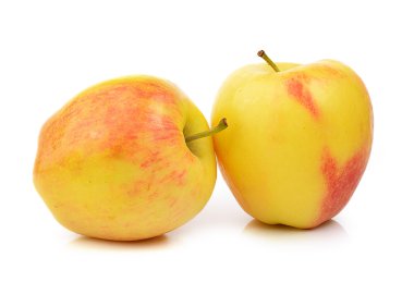 beyaz zemin üzerine sarı elma