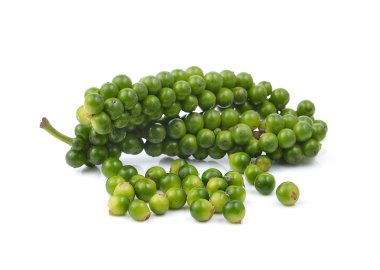 beyaz zemin üzerine biber tohumları