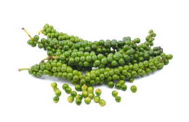 beyaz zemin üzerine biber tohumları