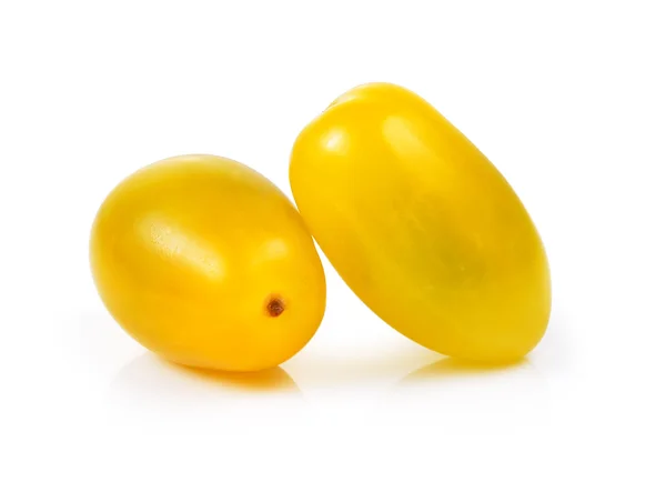 Gele tomaten op witte achtergrond — Stockfoto