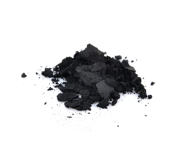 Carbón vegetal sobre un fondo blanco —  Fotos de Stock
