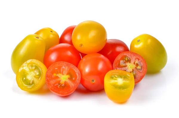 Red and yellow tomatoes on white background — Stock Photo, Image