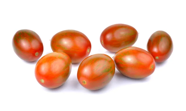 Choklad tomat eller brun färg tomat på vit bakgrund — Stockfoto