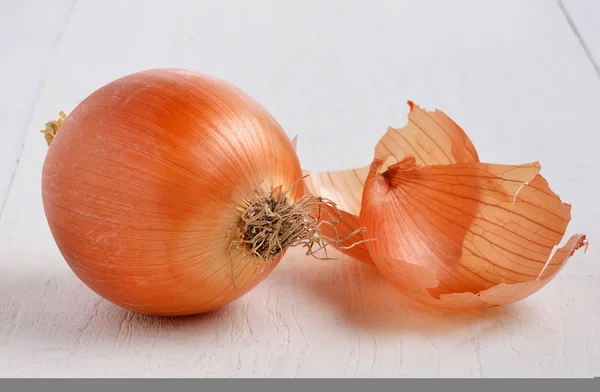 Cebola em madeira — Fotografia de Stock