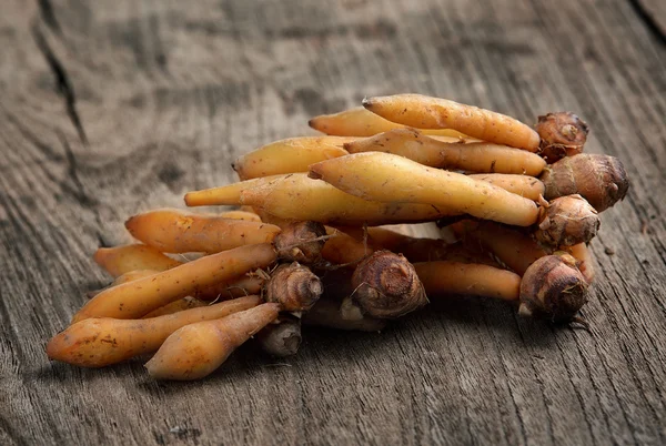 Fingerroot herb on wood background — Stock Photo, Image