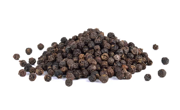 Black pepper seeds on white background — Stock Photo, Image