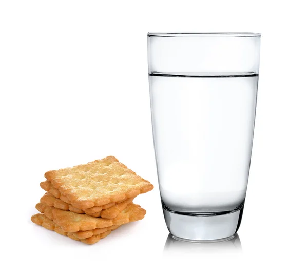 Glass of water and Cracker on white background — Stock Photo, Image
