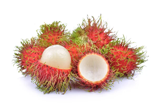 Rambutan på vit bakgrund — Stockfoto