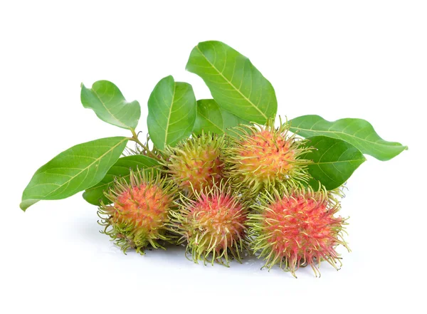 Rambutan på vit bakgrund — Stockfoto