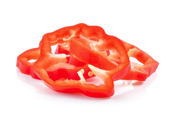 Φέτες κόκκινου πιπεριού σε λευκό φόντο — Φωτογραφία Αρχείου