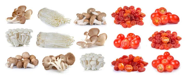 Червоні вишневі помідори, сушені помідори та гриби Шиітаке, Енокі — стокове фото