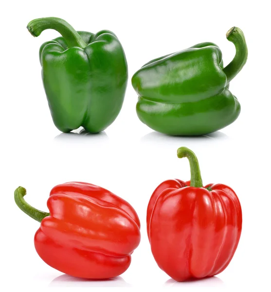 Red and green pepper over white background — Stock Photo, Image