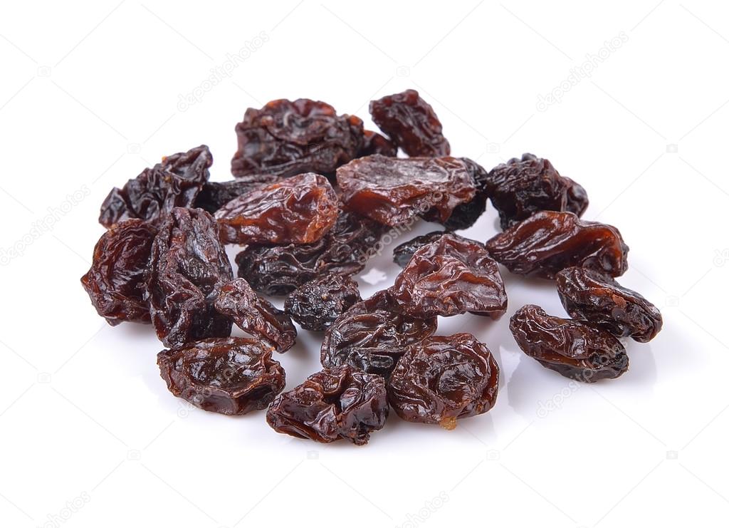 Dried raisins on a white background