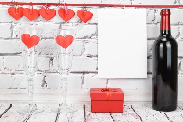 Two Glasses Hearts Gift Box Next Bottle Wine White Brick — Stock Photo, Image