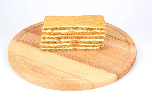 Torta Miele Una Tavola Legno Isolata Sfondo Bianco — Foto Stock