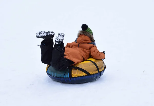 Boy Rides Mountain Inflatable Snow Tube Lying Head First — Stock Photo, Image
