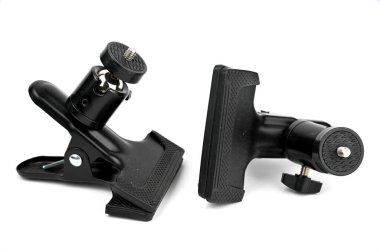 Devices with a pin for fixing photo accessories.