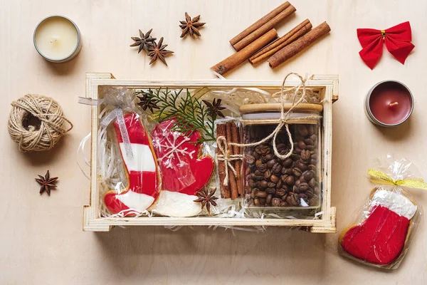 care package, seasonal gift box with coffee, gingerbread and cinnamon Personalized eco friendly basket for family, friends for thankgiving, christmas, mothers, fathers day Flat lay.