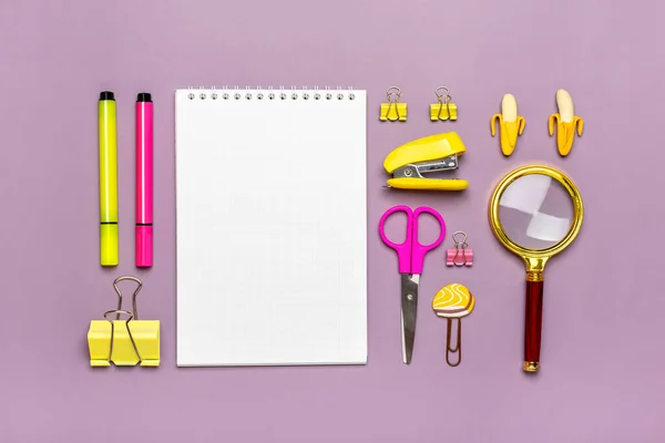 Stationary, back to school, summer time, creachment and education 컨셉트 스쿨 공급 - magnifier, pencils, pen, paper clips, stapler and echpad on purple background, flat lay Mock up Top view — 스톡 사진