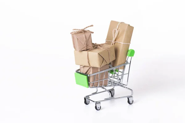 Shopping cart Filled With Many Boxes. Sales and Internet online shopping concept — Stock Photo, Image