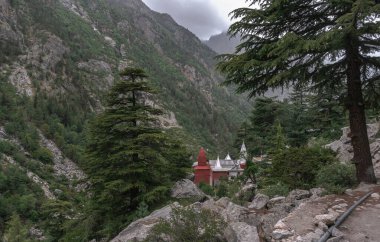 Gangotri is one of the main Hindu holy places of pilgrimage in the Himalayas. The trail from Gangotri to Gomukh runs between the mountain peaks. clipart