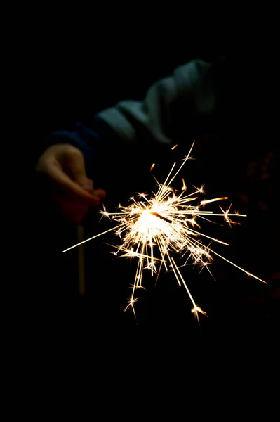 Burning Bengali Fire Dark Background Child Hand Make Wish New — Stock Photo, Image