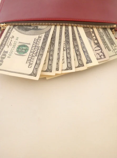 Geld - Dollar auf weißem Hintergrund — Stockbild Geld - Dollar auf weißem Hintergrund — Stockfoto