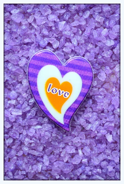 Heart on purple textural background