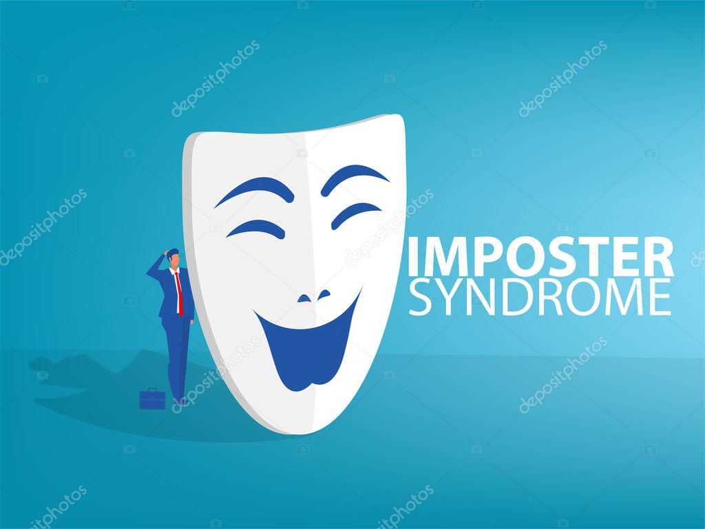 Imposter syndrome.man standing behind mask . Anxiety and lack of self confidence at work; the person fakes is someone else 