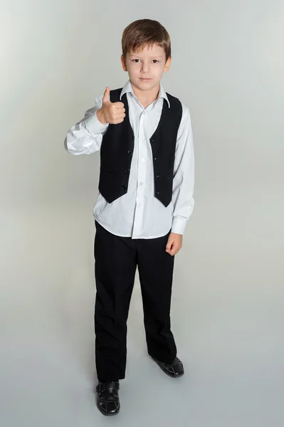 Boy giving thumbs up sign — Stock Photo, Image