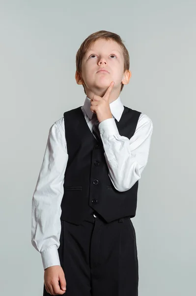 Thinking schoolboy — Stock Photo, Image