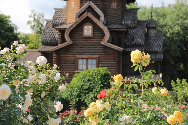 old wooden church in flowers