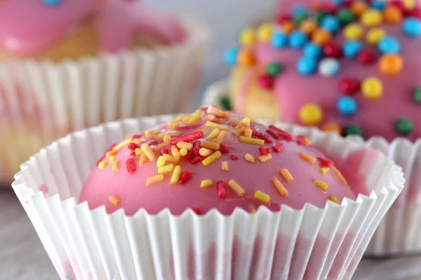 Cupcakes on a wooden table — Stock Photo, Image