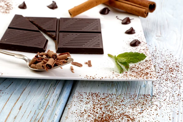 Dark chocolate on white plate — Stock Fotó