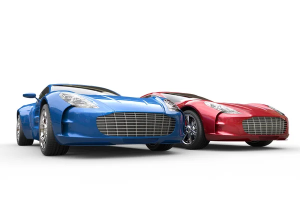 Dark blue and red metallic cars on white background — Stock Photo, Image