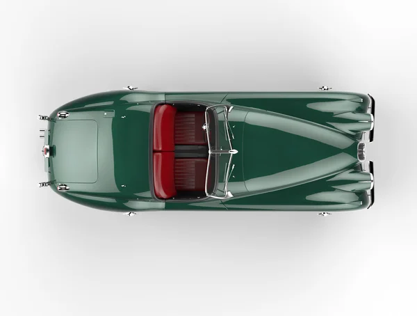 Зеленый автомобиль старого образца на белом фоне - вид сверху — стоковое фото