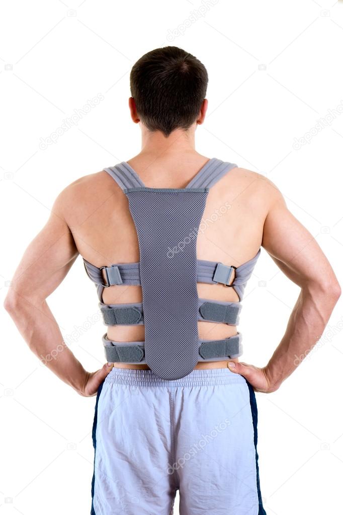Athletic Man Wearing Supportive Back Brace