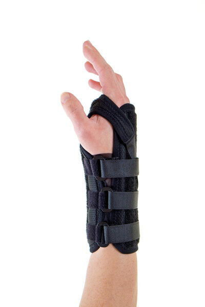Person Wearing Supportive Brace on Wrist