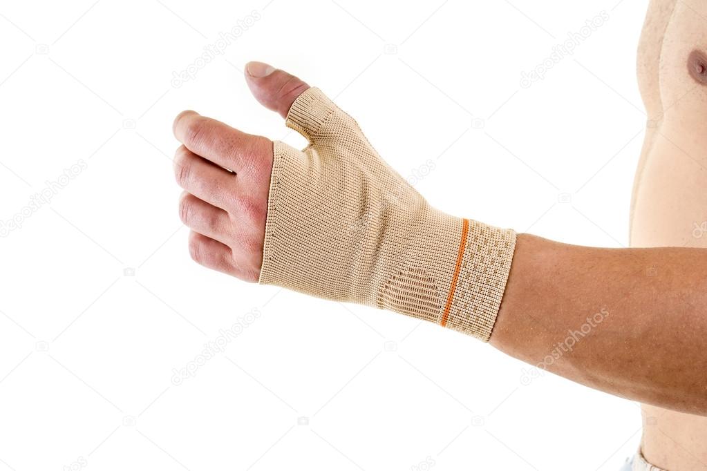 Man Wearing Flexible Wrist Brace Stock Photo by ©belahoche 103584584