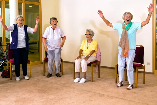 women practicing aerobic exercises