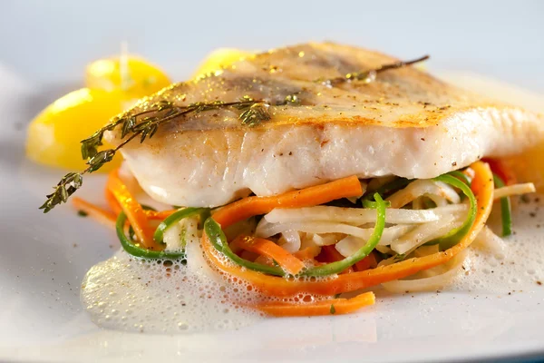 Fried pike perch with vegetables — Stock Image Fried pike perch with vegetables Royalty Free Stock Images