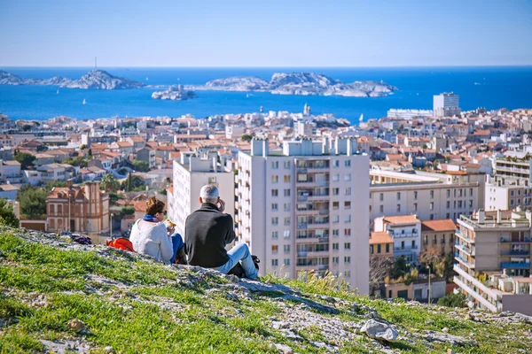 Couple on the hill looking at panorama of Marseille, France — Stock Photo, Image