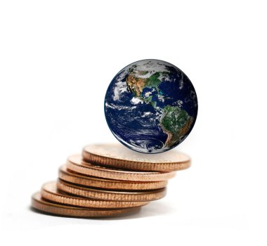 the earth on coins stacked ,including elements furnished by NASA