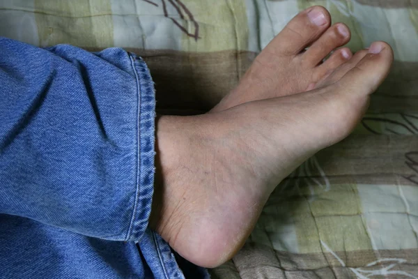 Man Foot Sofa — Stock Photo, Image