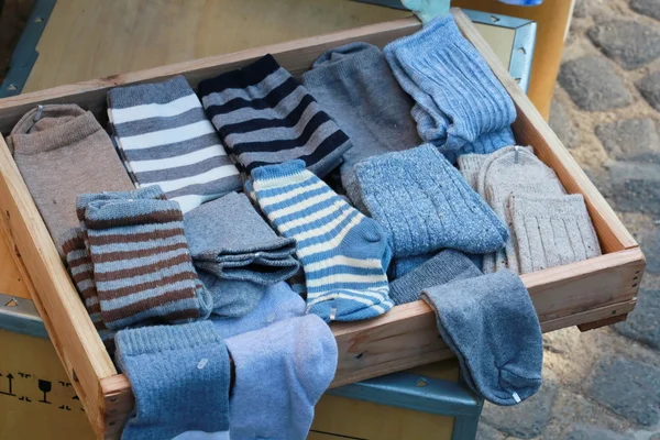 Many Blue Sock Wood Tray — Stock Photo, Image