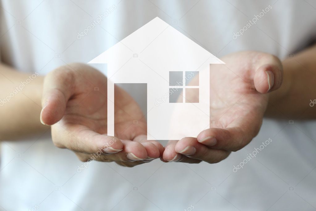 hand holding a house background