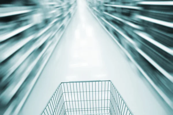 Blurred supermarket cart — Stock Photo, Image