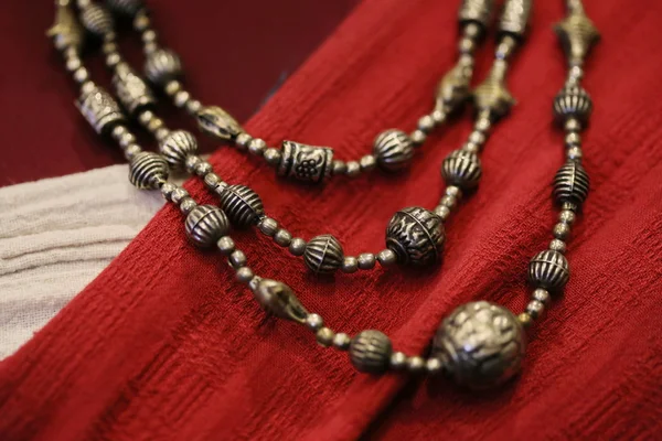 Vintage Metal Necklace Red Fabric — Stock Photo, Image